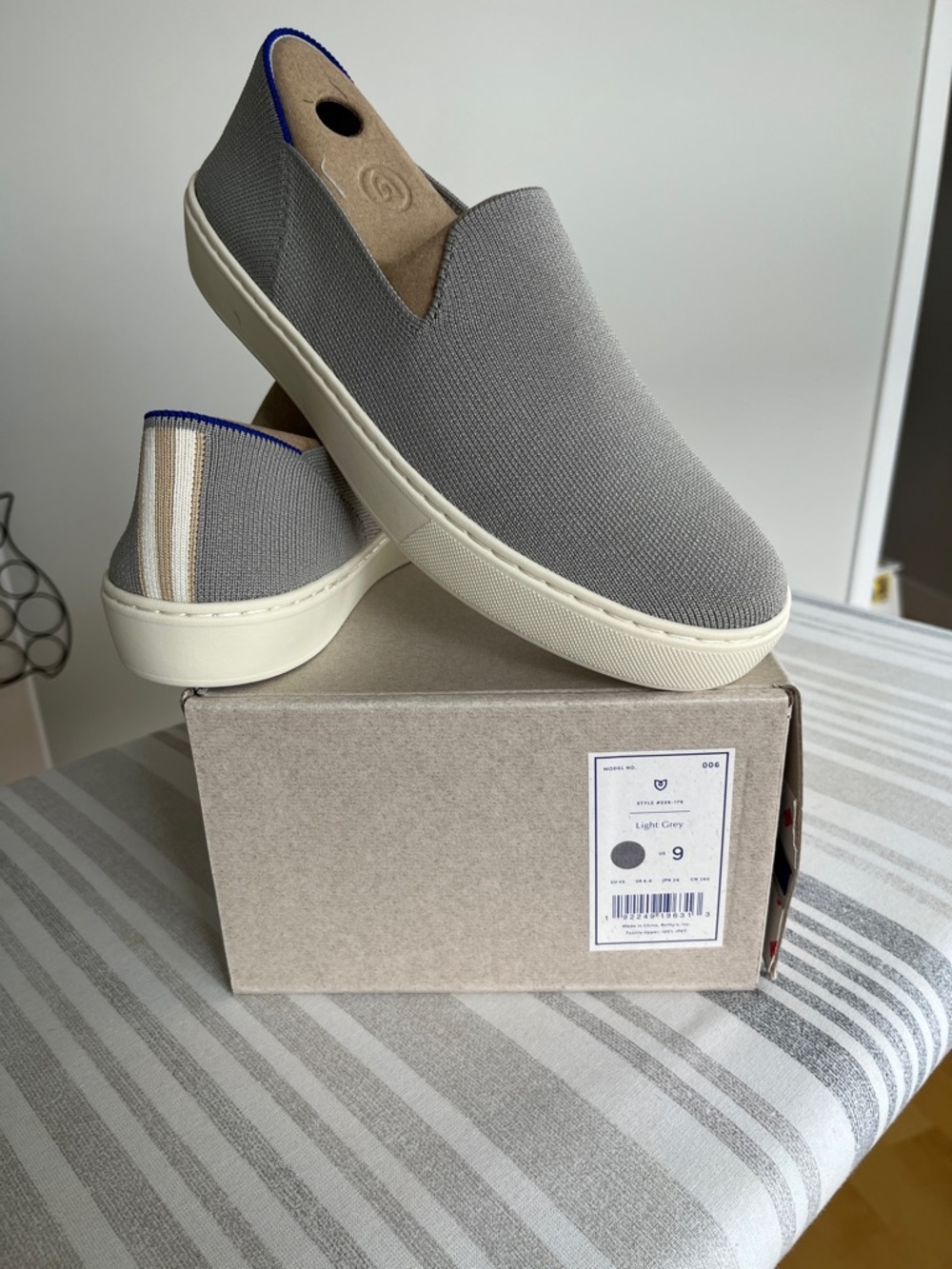 Rothy's slip on sneaker in light grey.